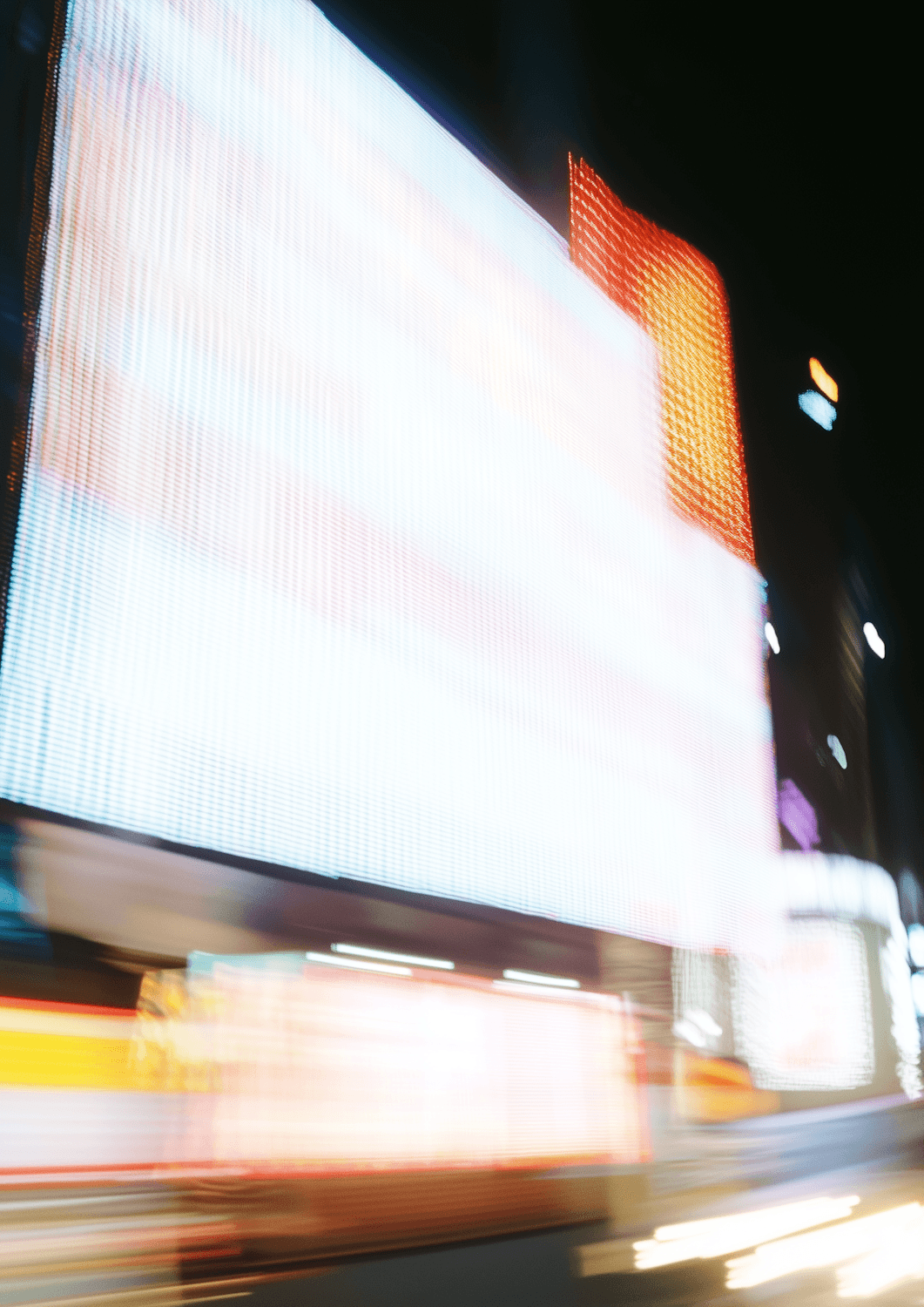 Bright city lights blurred at night