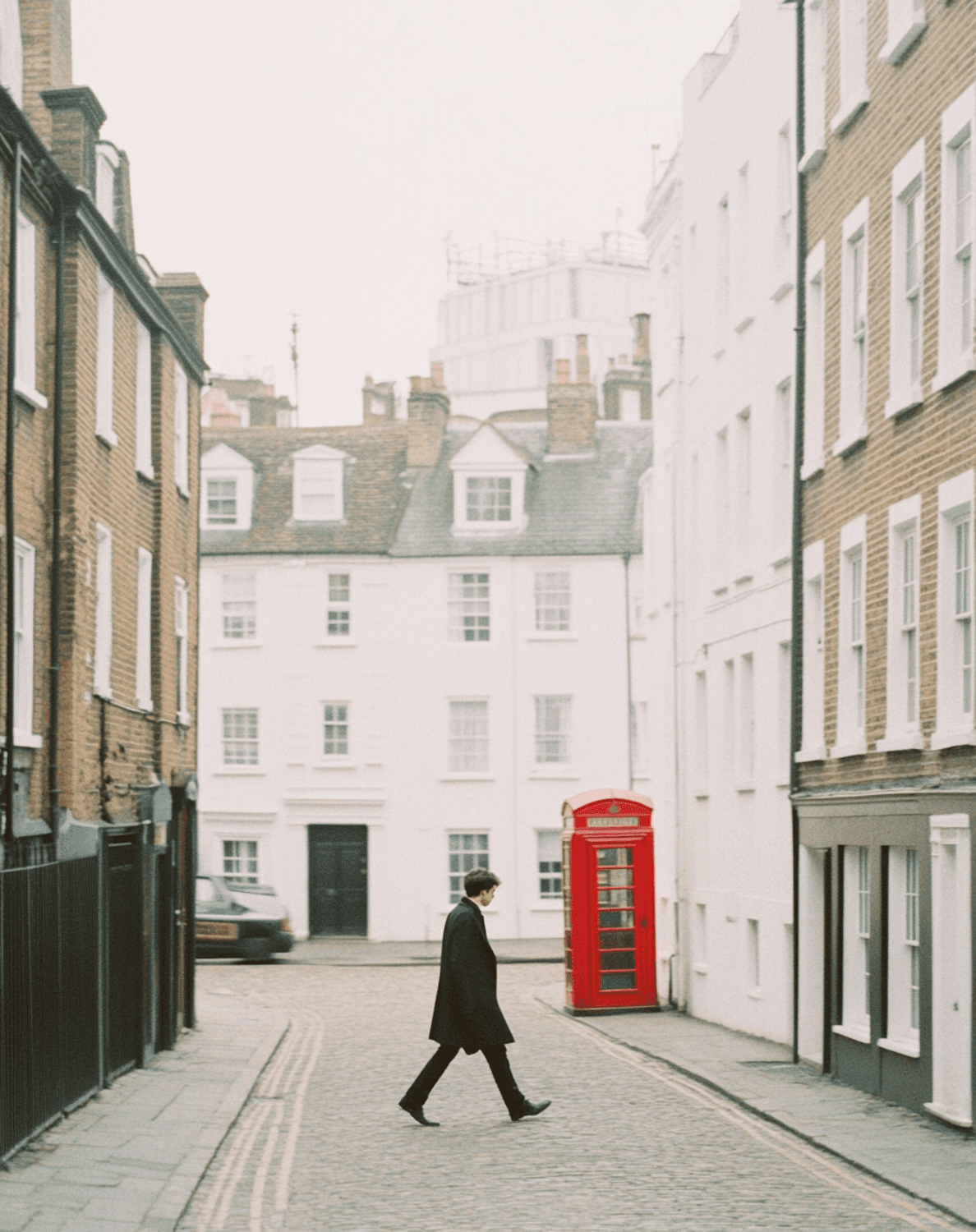 Cobbled London street with a red telephone box